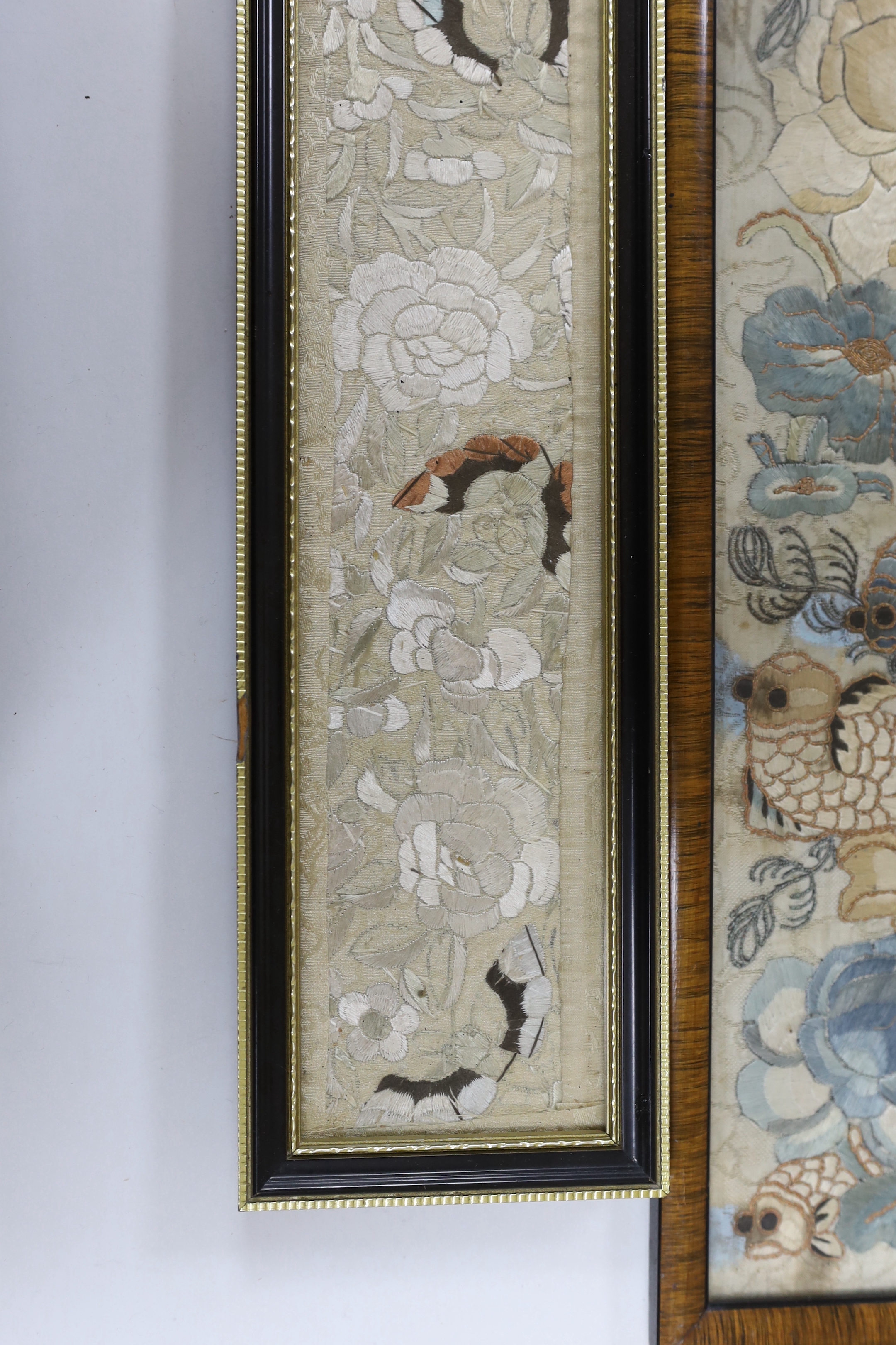 Three 19th century Chinese framed silk panels with embroidered decoration, largest 12 x 55cm